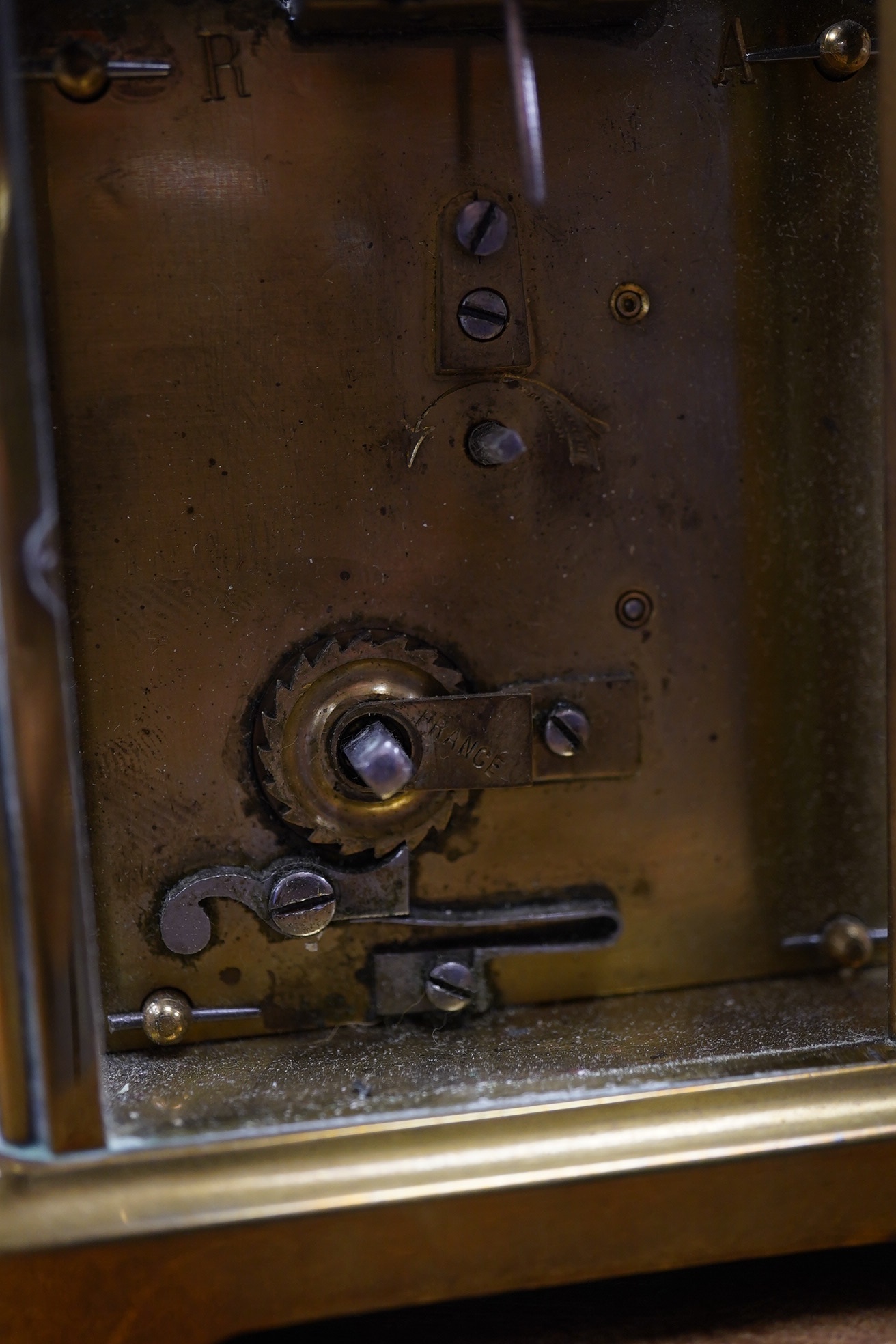A brass cased carriage timepiece, the enamel dial inscribed ‘Gold & Silversmith’, with case, no key, 13cm high. Condition - good, untested